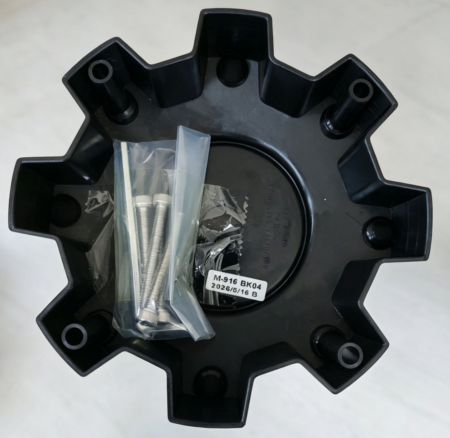 Back of Black Rhino M-916 BK04 wheel center cap