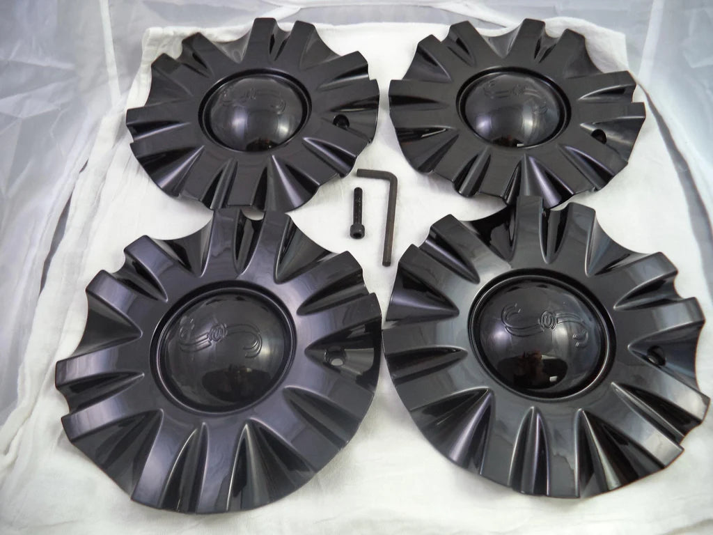 Four SSC Sears MCD8243YA01 gloss black caps