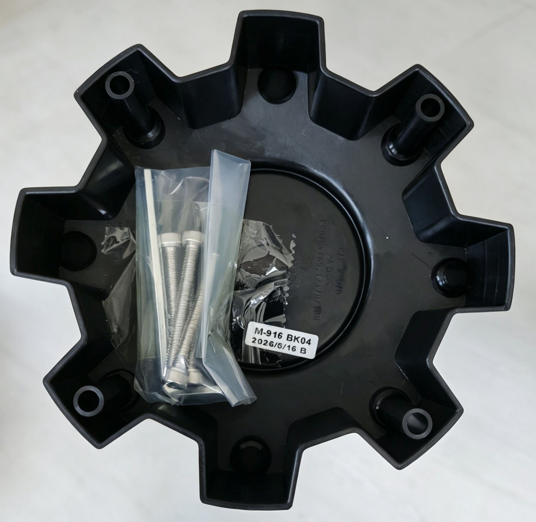 Back of Black Rhino M-916 BK04 wheel center cap